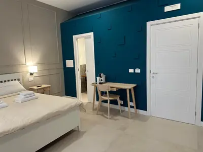 Letto o letti in una camera di Terrazza Carbonara B&B
