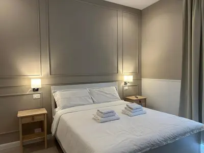 Letto o letti in una camera di Terrazza Carbonara B&B