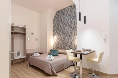Letto o letti in una camera di Alor Suite