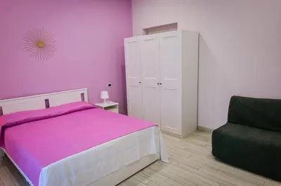 Letto o letti in una camera di La Stella di Giulietta Piazza Cavour