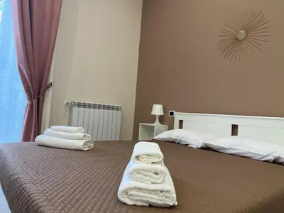 Letto o letti in una camera di La Stella di Giulietta Piazza Cavour