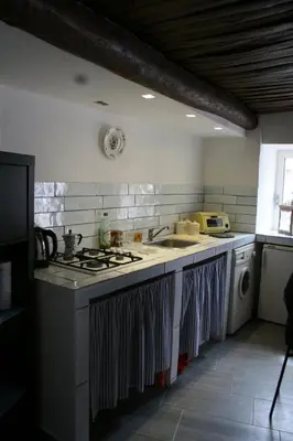 Cucina o angolo cottura di Appartamento sul Teatro Romano Antico