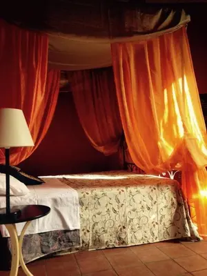 Letto o letti in una camera di Appartamento sul Teatro Romano Antico
