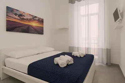 Letto o letti in una camera di GG-ROOM - San Giovanni