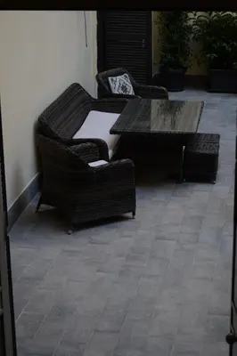 Area soggiorno di Al San Carlo Rooms