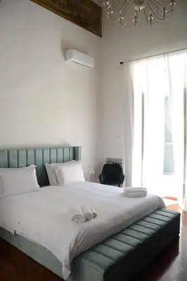 Letto o letti in una camera di Al San Carlo Rooms
