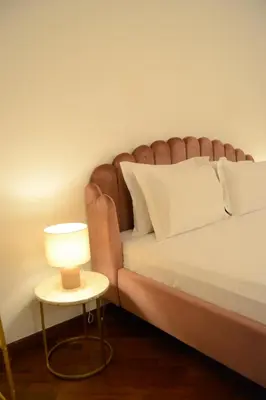 Letto o letti in una camera di Al San Carlo Rooms