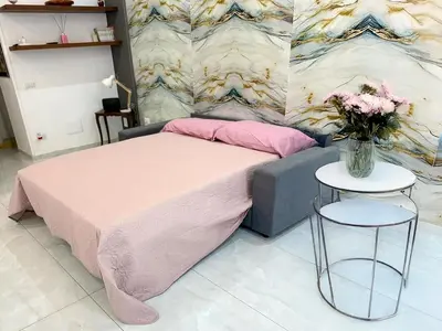 Letto o letti in una camera di Anema&Core house