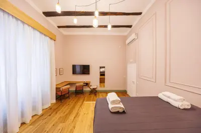 Letto o letti in una camera di The Tribunali Apartments By HouseinNaples
