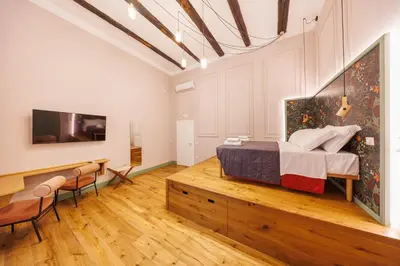 TV o dispositivi per l'intrattenimento presso The Tribunali Apartments By HouseinNaples