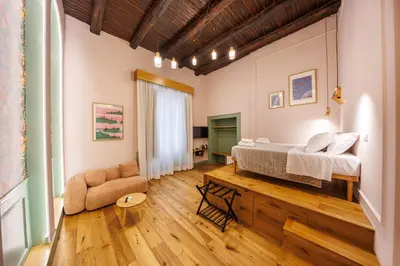 Letto o letti in una camera di The Tribunali Apartments By HouseinNaples