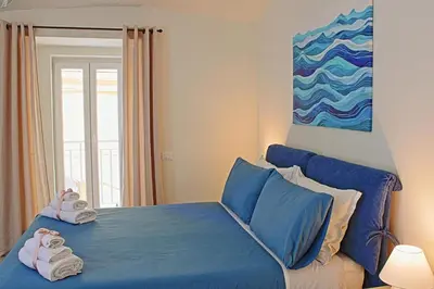 Letto o letti in una camera di Casa Salimbeni