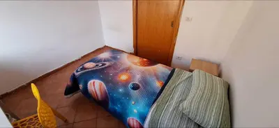 Letto o letti in una camera di Domus Baiano