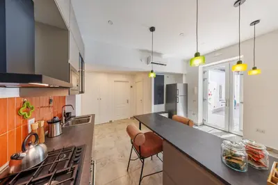 Cucina o angolo cottura di The Tribunali Apartments - Entire Apt - By HouseinNaples