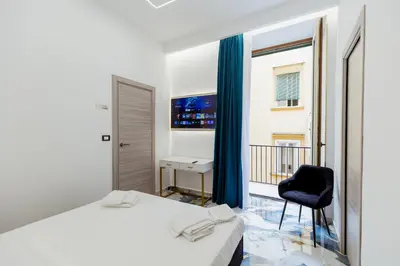 Letto o letti in una camera di Camera a Napoli
