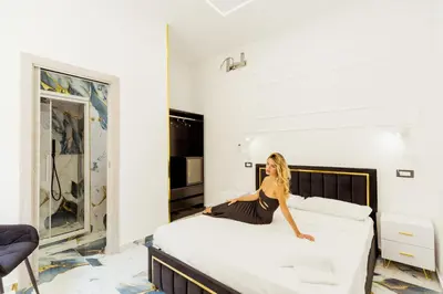 Letto o letti in una camera di Camera a Napoli