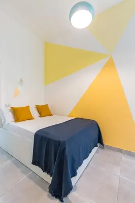 Letto o letti in una camera di Forino Central by Wonderful Italy