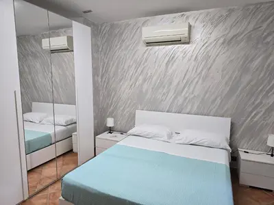 Letto o letti in una camera di Napoli Central Museo Suite near to Subway & Quartieri Spagnoli