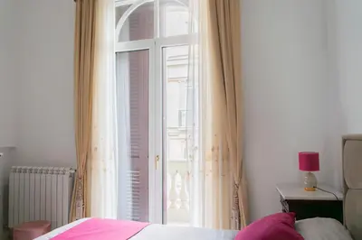 Letto o letti in una camera di B&B del Sole