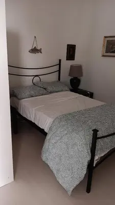Letto o letti in una camera di Donnaregina