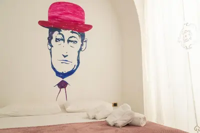 Letto o letti in una camera di Totò Style Apartment
