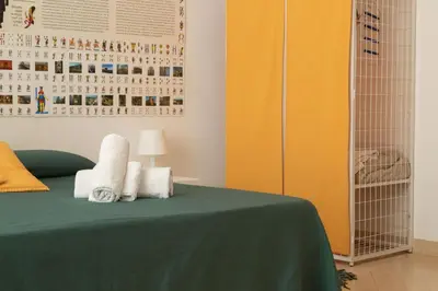 Letto o letti in una camera di Totò Style Apartment