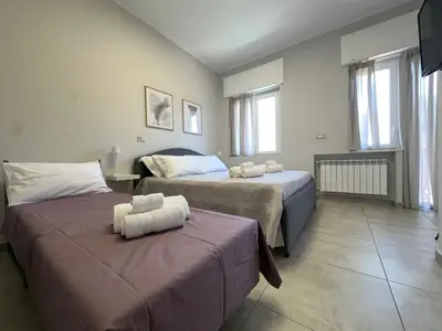 Letto o letti in una camera di Rossini37 Apartment