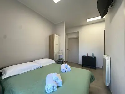 Letto o letti in una camera di Rossini37 Apartment