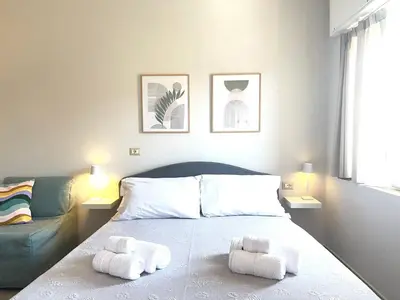Letto o letti in una camera di Rossini37 Apartment