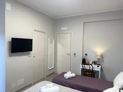 TV o dispositivi per l'intrattenimento presso Rossini37 Apartment