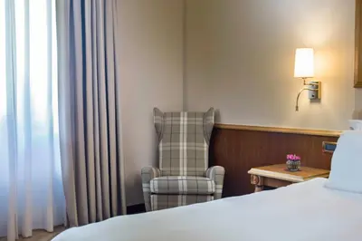 Letto o letti in una camera di Renaissance Naples Hotel Mediterraneo