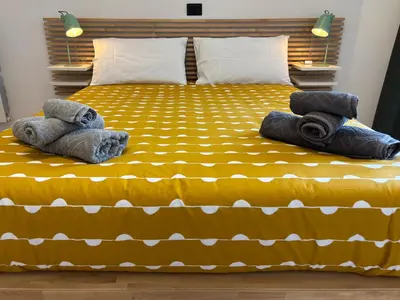 Letto o letti in una camera di Antignano 11