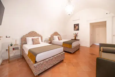 Letto o letti in una camera di Ruffo Apartment