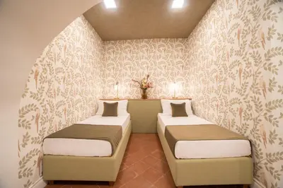 Letto o letti in una camera di Ruffo Apartment