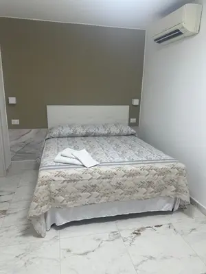 Letto o letti in una camera di Luckys Room