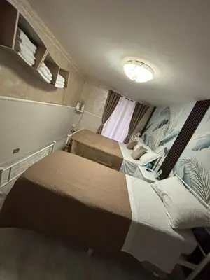 Letto o letti in una camera di Casa Concettina