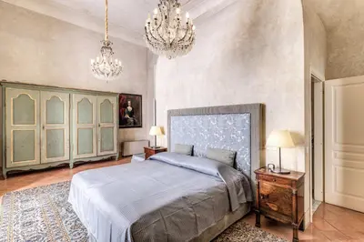 Letto o letti in una camera di Palazzo Doria Suites