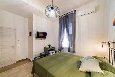 Letto o letti in una camera di San Gregorio Suite&Rooms