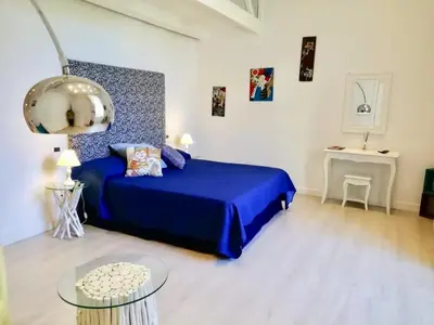 Letto o letti in una camera di B&B Neapolis Bellini