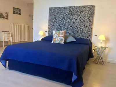 Letto o letti in una camera di B&B Neapolis Bellini