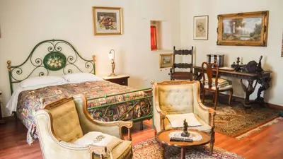 Letto o letti in una camera di B&B Graziani Relais