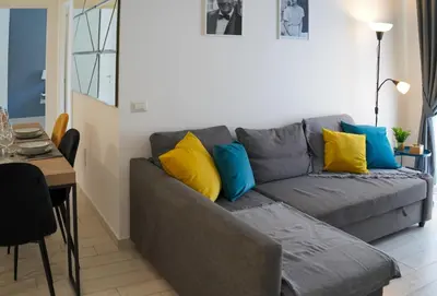 Area soggiorno di Scugnizzo Apartment CHIAIA