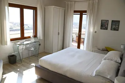 Letto o letti in una camera di Bed & Breakfast Casamiranapoli Suites