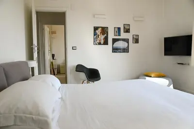 Letto o letti in una camera di Bed & Breakfast Casamiranapoli Suites