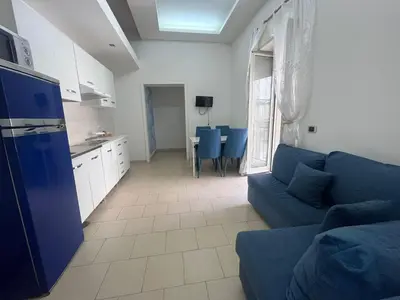 Area soggiorno di Tribunali Cozy Apartment