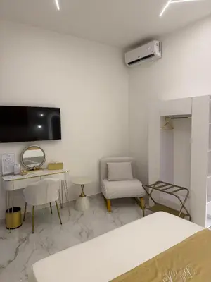 Area soggiorno di Belle Ame Suites