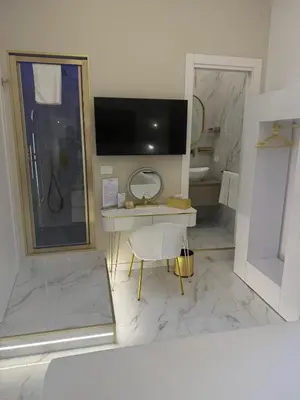 TV o dispositivi per l'intrattenimento presso Belle Ame Suites