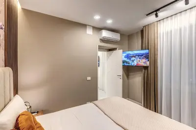 Letto o letti in una camera di Sanità Naples Central Grand Apartment for 10 Guest