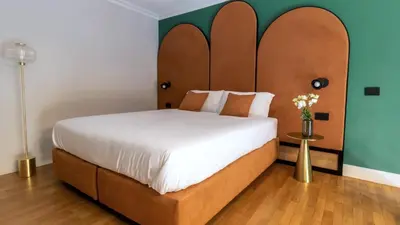 Letto o letti in una camera di Musto Boutique Apartments