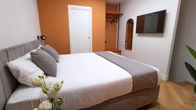 Letto o letti in una camera di Musto Boutique Apartments